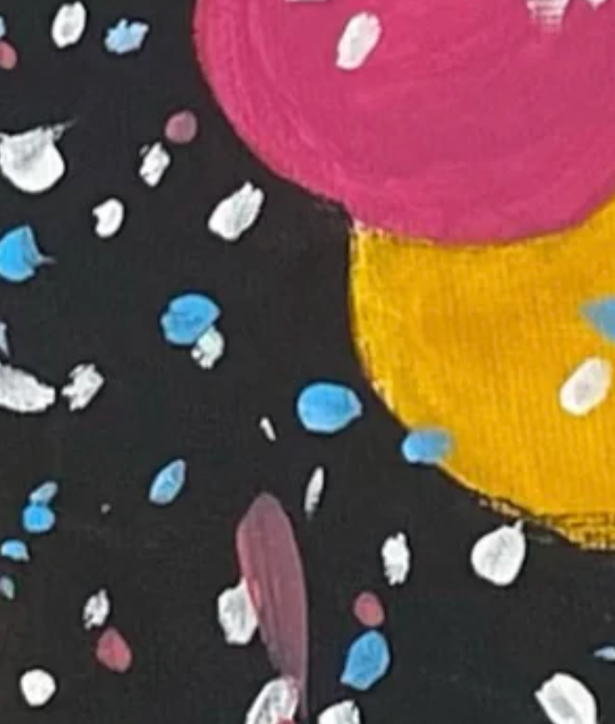 Colorful polka dot pattern on a black background