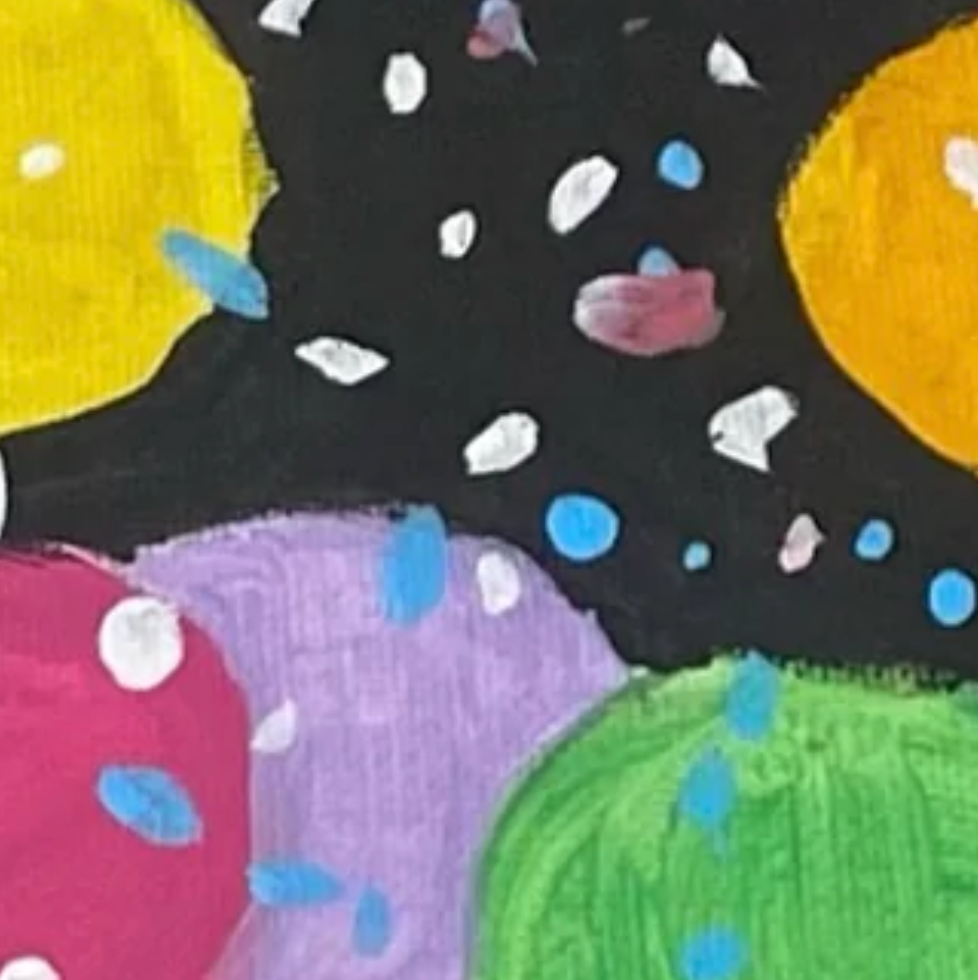 Colorful polka dot pattern on a black background