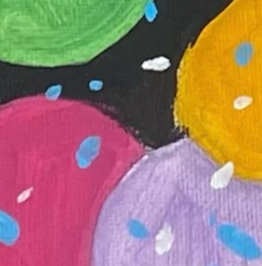 Colorful polka dot pattern on a black background