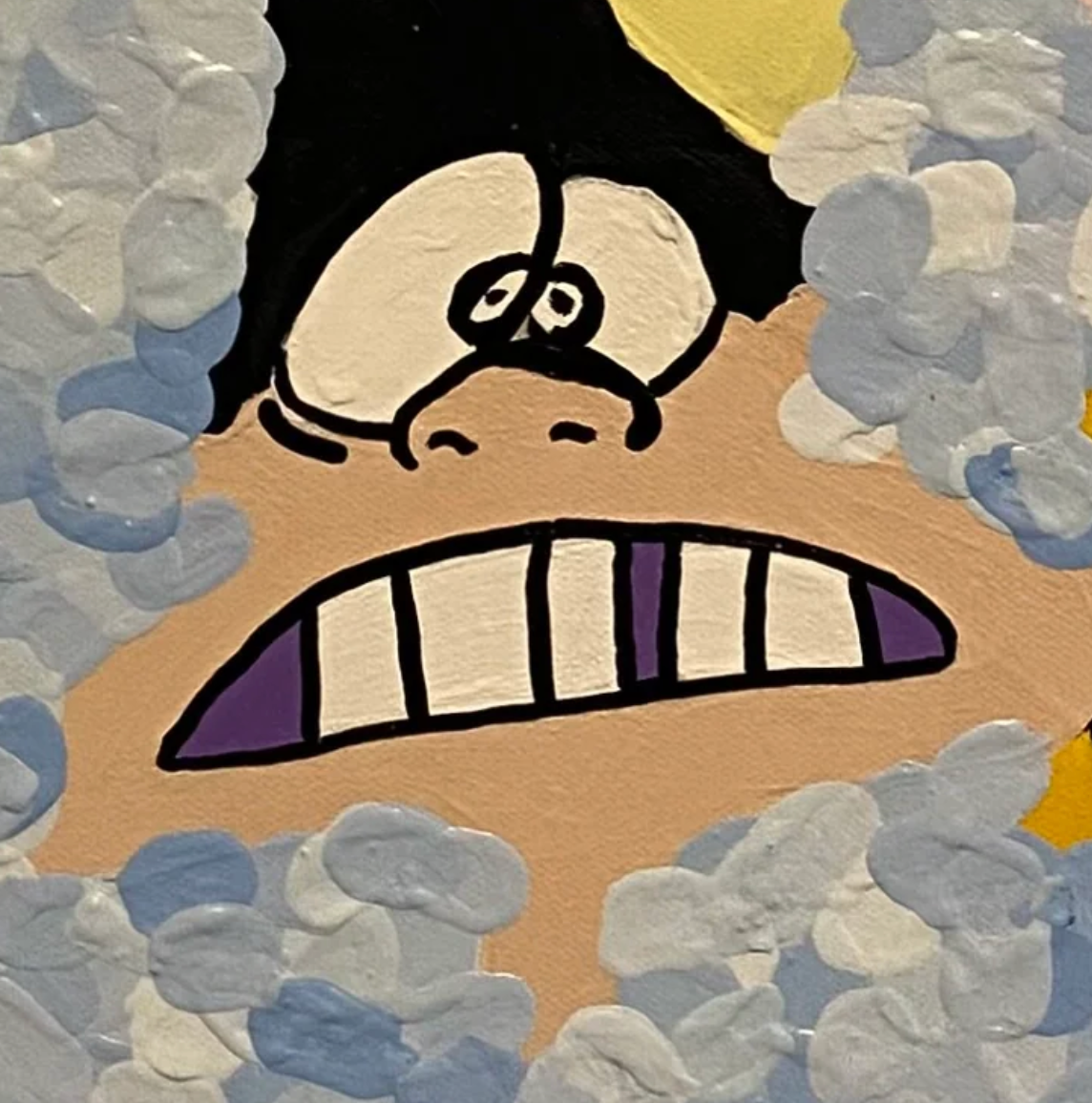 Cartoonish face with wide opened eyes on a textured blue background.