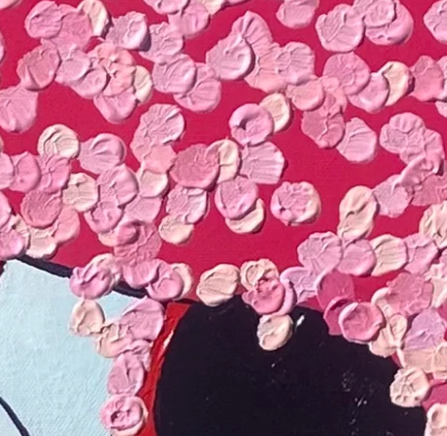 Close-up of pink flower-like petals on a red background