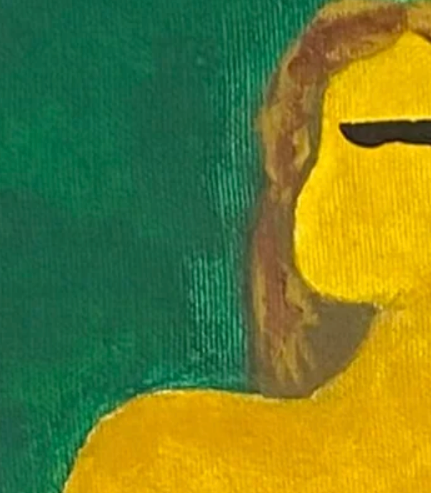 Close-up of a yellow character with a green background