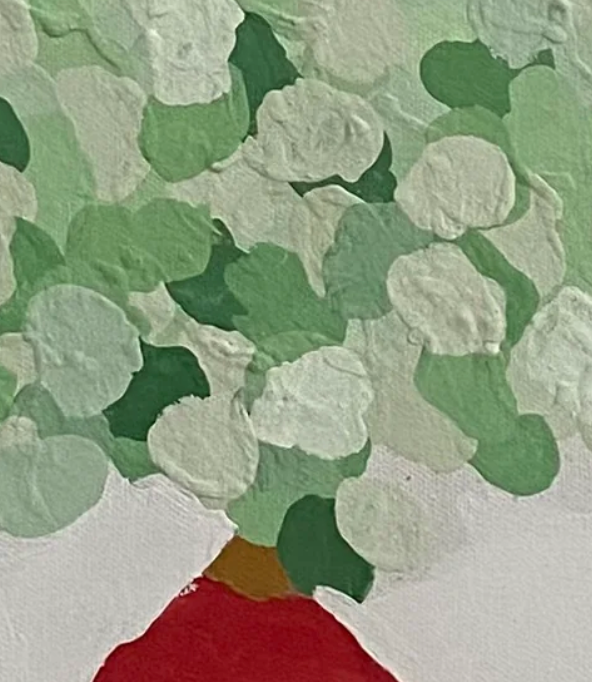 textured surface with green, red, and white colors