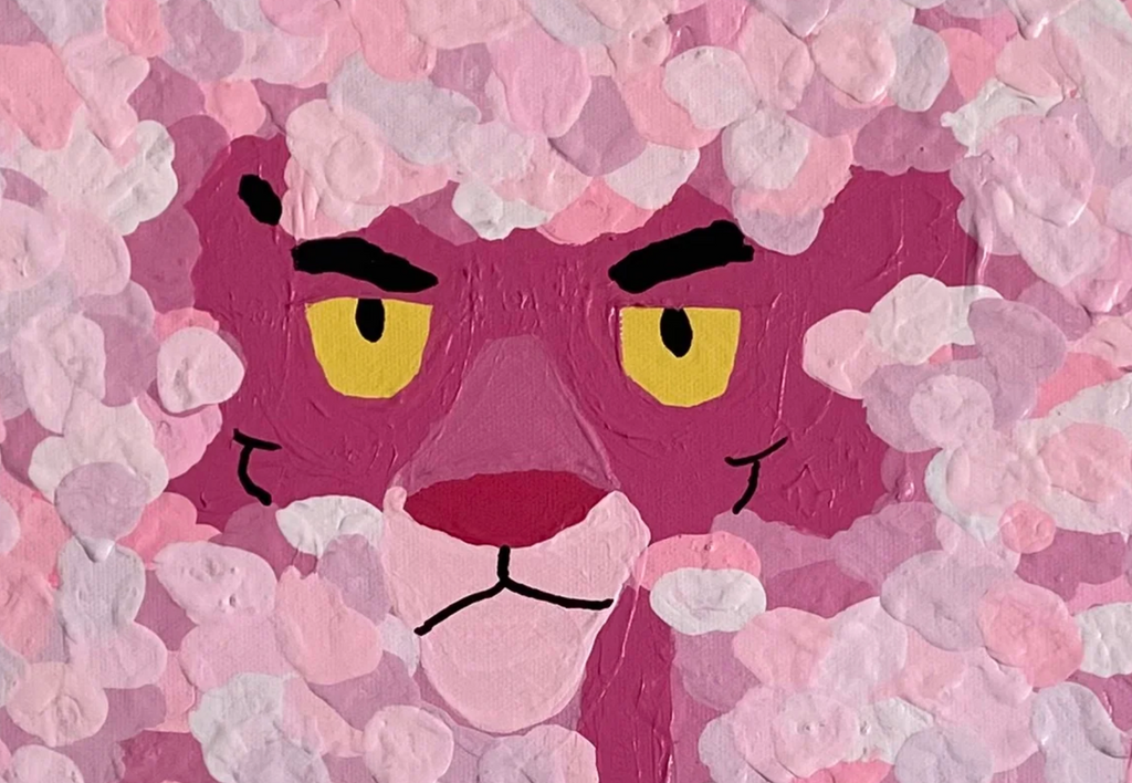 Cartoon character with pink face and yellow eyes surrounded by pink background