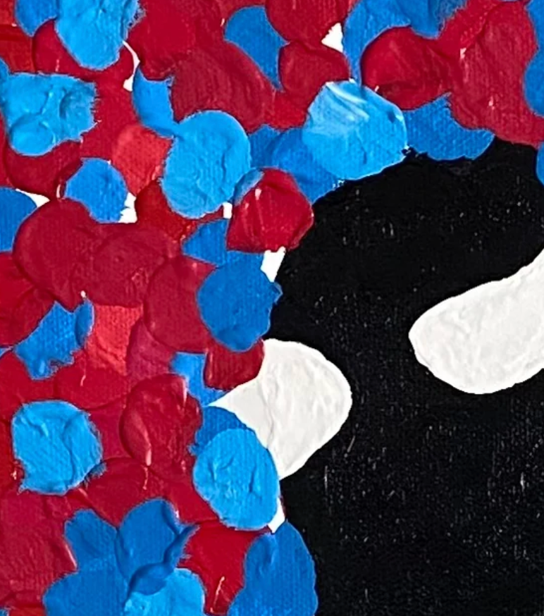 textured surface with black, blue, red, and white colors