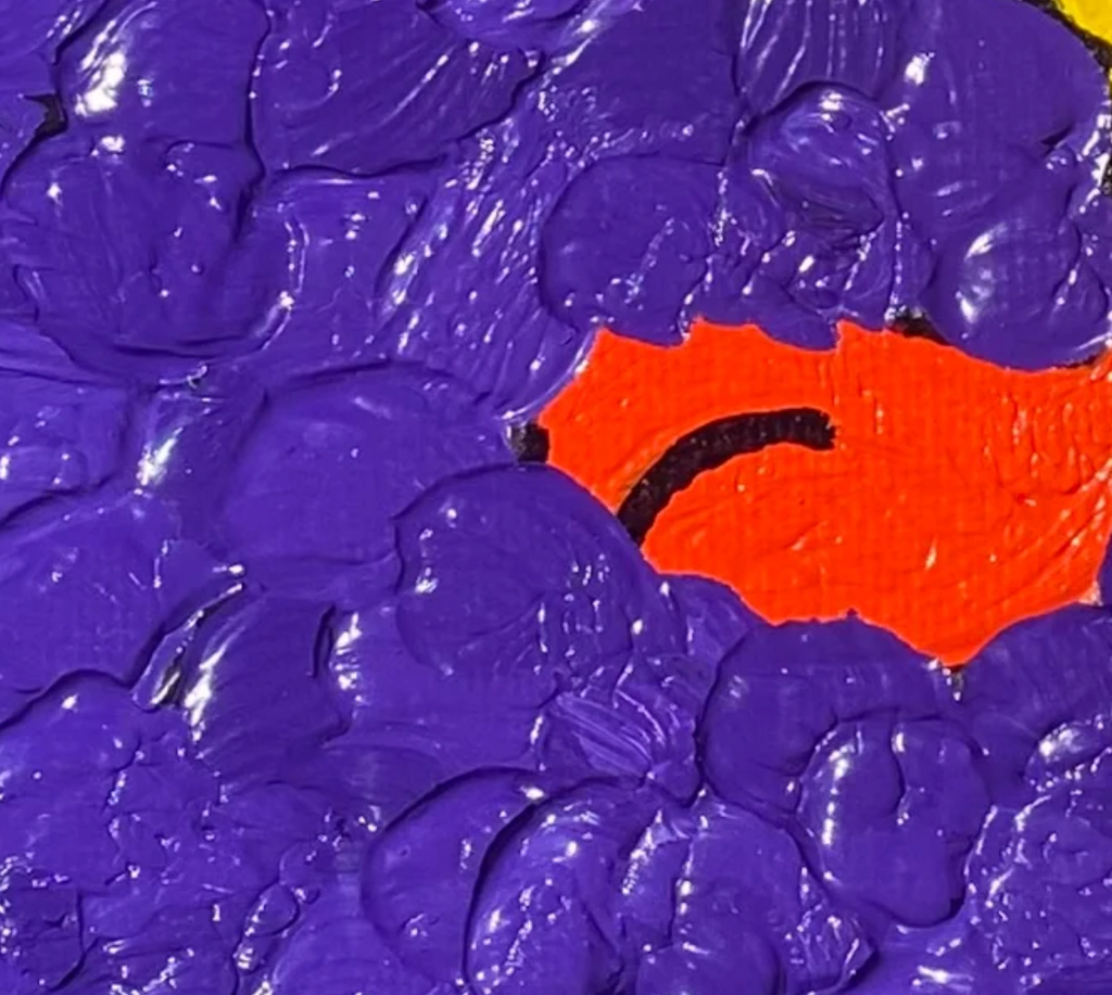 Close-up of purple and orange textured surface