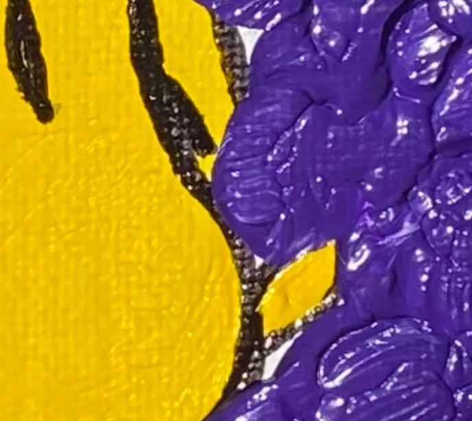 Close-up of a textured purple and yellow surface