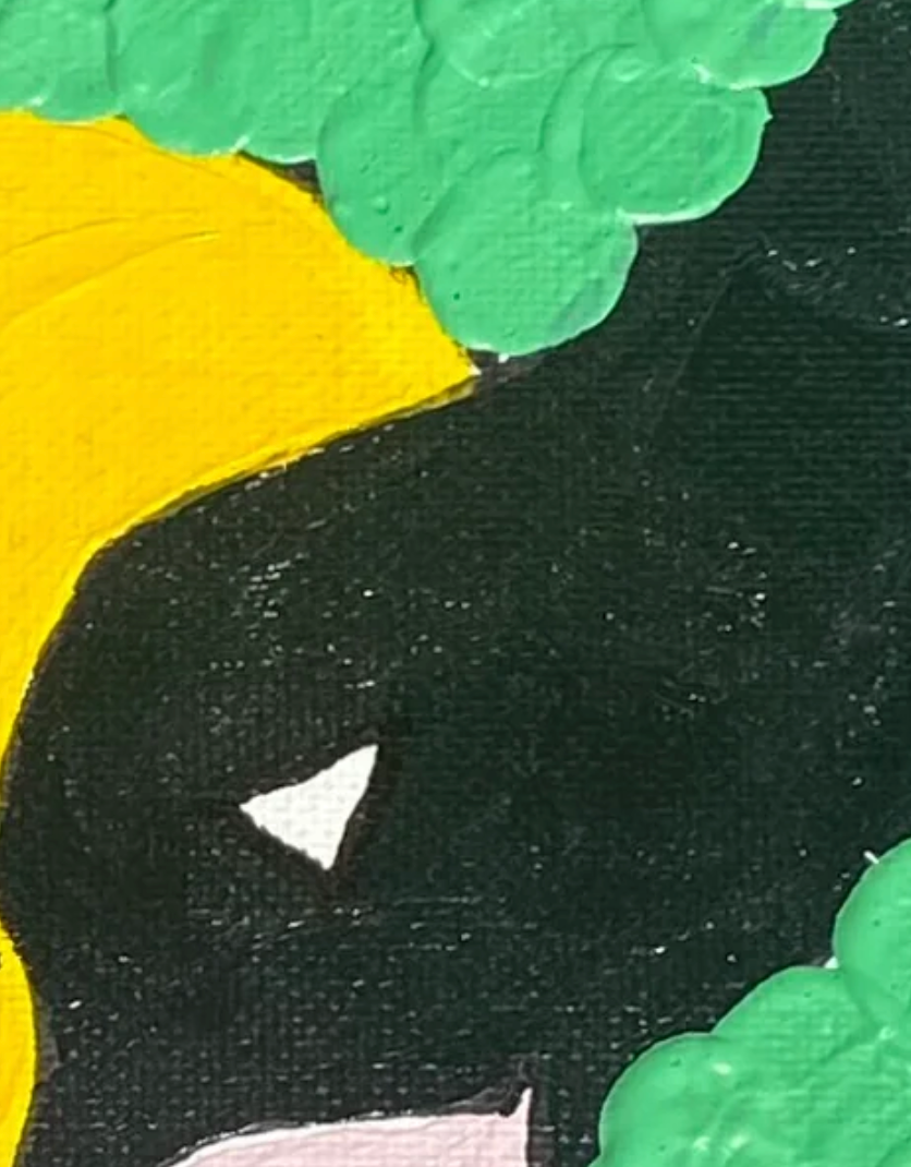 Close-up of a black silhouette with a white triangle on a textured surface with green and yellow elements.